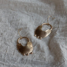 Load image into Gallery viewer, Handcrafted Bamasha earrings made from recycled brass with nickel-free hoops and a beautiful satin finish, perfect for any occasion and eco-friendly fashion. Each pair is one-of-a-kind and handmade by our artisan partners in Malawi.