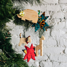 Load image into Gallery viewer, Hand Carved Animal Ornament