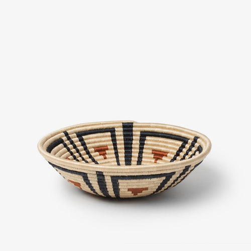 Akazi Burnt Orange hand woven basket by artisans from Rwanda. Free trade and ethically made.